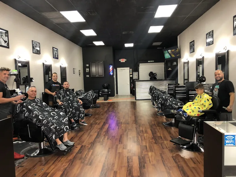 Clients and barbers at the Cape Coral shop
